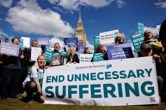 epa11308684 Pro-assisted dying campaigners gather outside the UK Houses of Parliament as MPs prepare to debate over changing the law on assisted dying, in London, Britain, 29 April 2024. Following a petition backed by Dame Esther Rantzen, the UK Parliament will debate assisted dying and assisted suicide, which is currently illegal in the UK. EPA/TOLGA AKMEN