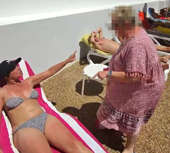 Story from Jam Press (Karen Sunbed Wars) Pictured: Video grab - Angry 'Karen' goes berserk at holidaymakers for taking her spot. VIDEO: Let the sunbed wars begin! Angry 'Karen' goes berserk at holidaymakers for taking her spot An angry ?Karen? has kicked off the 2025 sunbed wars by going berserk at holidaymakers for taking her spot. The infuriated guest made her feelings known when she gave a pair of unsuspecting sunbathers an earful of abuse. The woman, wearing a pink cover up, was spotted accusing a couple of being in the spot she had been using ?all week?. Callum Lines heard the commotion while soaking in the sun by the pool. And he quickly captured the incident on camera. ?The Scottish lady said they had been using those beds all week, accusing the couple lying down of moving their items,? Callum Lines, 31, told NeedToKnow. ?Just to the left, out of shot, was a sign stating no reservation of sunbeds. ?I?m not sure this was the case though. ?The Scottish lady left to apparently seek management but they never showed up. ?I?ve always got two pence to share even when it?s probably not required, but you come away for a rest and some relaxation. ?There were plenty more available beds - all with equal sun exposure - so this really wasn?t needed.? Callum, from Leamington Spa, even got an earful himself. The woman could be heard saying: ?Don?t be cheeky, don?t be smart mouthed either. ?You don?t know who you?re talking to and you don?t know who we?re here with. ?So just keep your f**king mouth shut.? One woman wearing a black cap and bikini could be seen gesturing to the ?Karen? to walk away. The pair went back and forth as the woman in pink claimed someone had moved their beds. The dispute took place poolside at the Hyde Park Lane apartments in Lanzarote on 1 April. ENDS EDITOR'S NOTES: We would advise publications to blur the face of the woman in the pink dress prior to publication. Grabs from the video have been provided with pixelation for use. Video Usage Licence:(EXCLUSIVE) We have obtained an exclusive licence from the copyright holder. A copy of the licence is available on request. Video Restrictions: None.