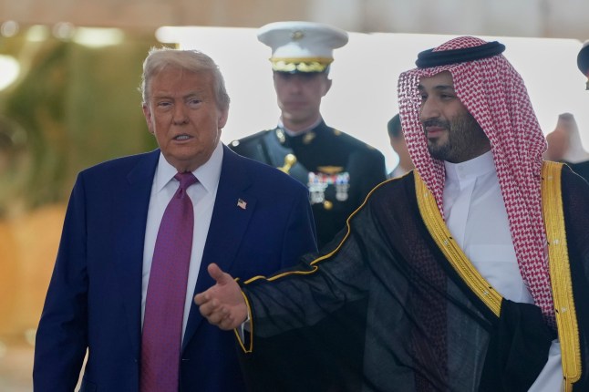 Saudi Crown Prince Mohammed bin Salman welcomes President Donald Trump during an arrival ceremony at the Royal Terminal of King Khalid International Airport in Riyadh, Saudi Arabia, Tuesday, May 13, 2025.(AP Photo/Alex Brandon)