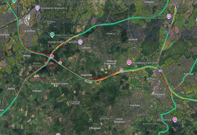 A map shows delays on the M25 after a crash in Surrey.