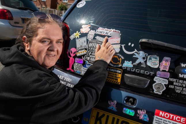 Needs writing in a fun way: Woman faced six months jail for offensive bumper sticker (image needs muzzing/blurring)